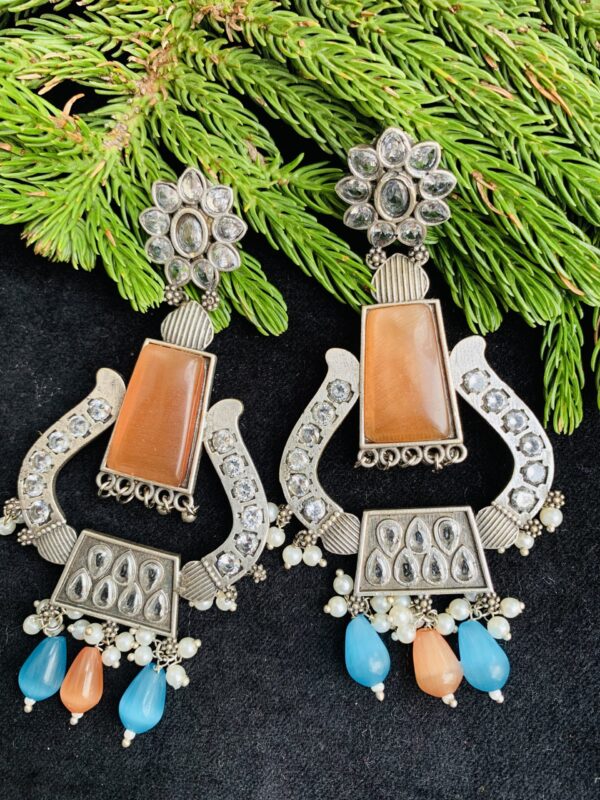 german-silver-orange-blue-stone-earrings (2) german-silver-orange-blue-stone-earrings (2)