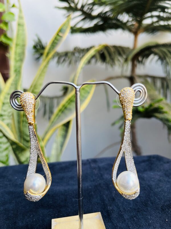 Indian-mores-AD-golden-silver-moti-earrings-2-scaled