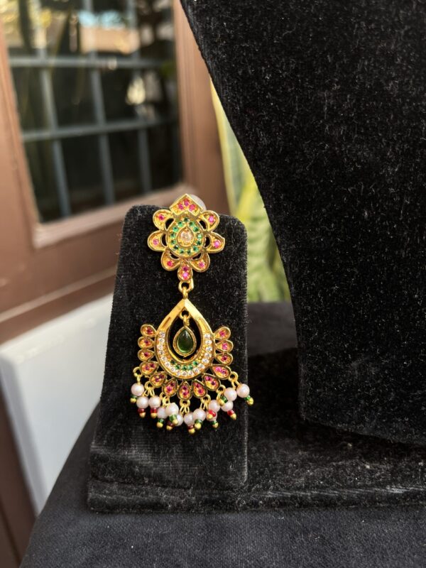 Indian-mores-jadau-red-color-drop-pendant-chid-moti-necklace-set (3) Indian-mores-jadau-red-color-drop-pendant-chid-moti-necklace-set (3)